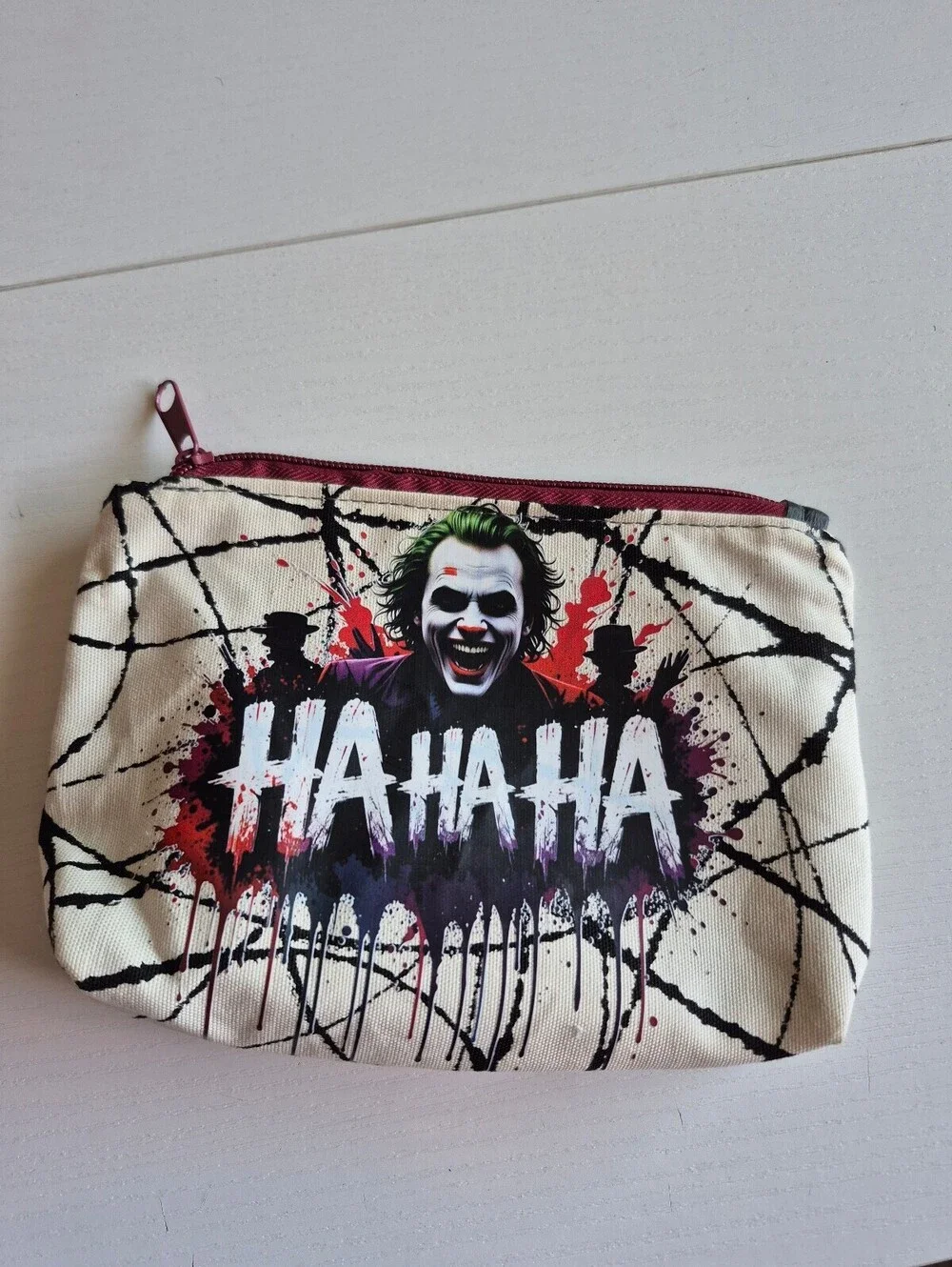 super villian laughing paint splatter Versatile Cosmetic Pouch creme, black